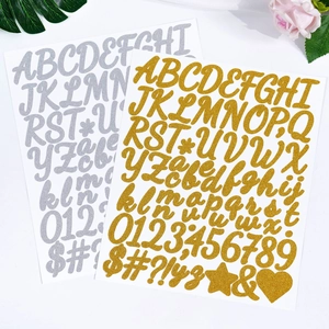 Detailed view of gold and silver glitter alphabet stickers with letters and numbers