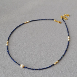 Minimalist lapis lazuli and freshwater pearl beaded necklace with gold lobster clasp