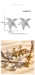 Detailed size chart showing gold and silver starfish earrings on a natural stone base