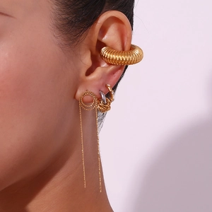 Minimalist C-shaped wrapped gold and silver earrings set with layered chain detail