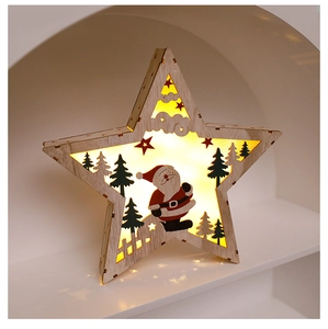 Detail of wooden star-shaped Christmas lamp with Santa cutout and warm LED light