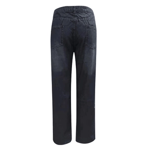 Close-up of the back pockets and stitching details on dark grey distressed denim jeans