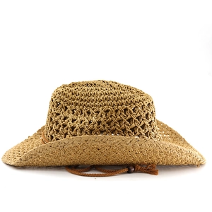 Detail of straw cowboy hat featuring breathable hollow mesh and woven chin strap