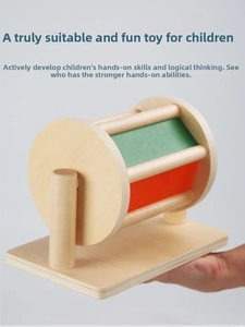 Close-up of a wooden Montessori spinning drum toy for sensory early development