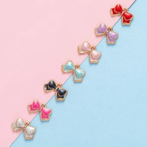 Colorful enamel bowknot charms with golden metal edges for DIY jewelry making