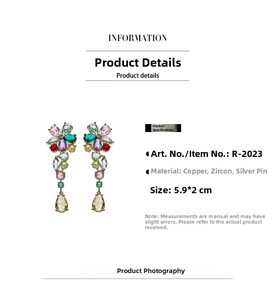 Macro detail of multicolored zircon floral earrings with pear-shaped gemstone drops