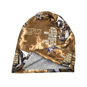 Detail of earthy brown beanie featuring intricate space illustrations and Capricorn text