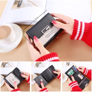 Detail view of tri-fold wallet showing interior card slots and 11.5cm compact dimensions