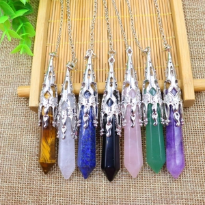 Set of seven natural hexagonal crystal necklaces including tiger eye and amethyst