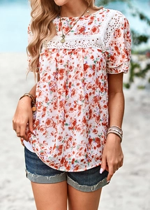 Detail of floral print blouse with lace stitching and double ruffle sleeves for women