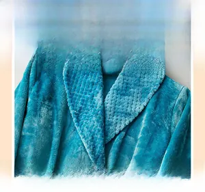 Detailed close-up of blue flannel bathrobe featuring a textured pineapple grid collar