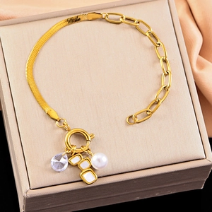 Elegant gold bracelet with shell square, pearl, and teardrop charms on a mix chain