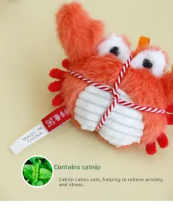 Detailed view of red plush crab cat toy with catnip stuffing and soft textured fur