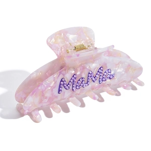 Pink marble acetate hair claw clip with Mama rhinestone lettering and gold spring