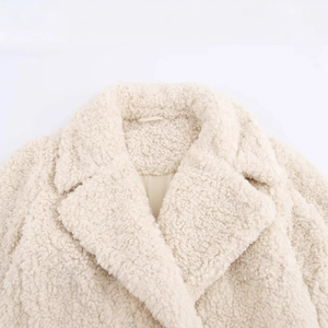 Women's cream white faux fur teddy coat with soft textured sherpa fabric and chic collar