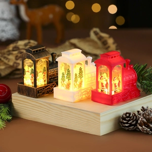Lighted Christmas train lanterns in bronze, white, and red with warm festive LED glow