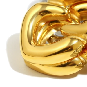 Macro shot of 18K gold plated stainless steel curb chain with polished glossy finish