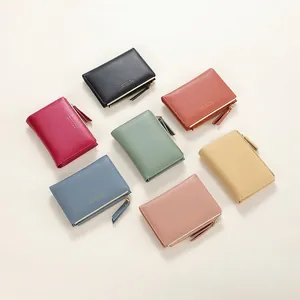 Short minimalist zip wallets for women in seven colors with Forever Lucky text