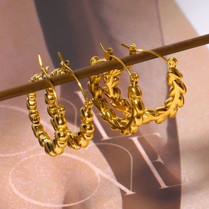 Bamboo textured 18K gold plated hoop earrings with minimalist woven design details