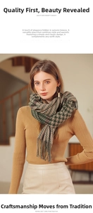 Close-up of green and brown houndstooth check scarf with soft fringe tassel detail