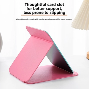 Detail of pink PU leather folding vanity mirror with multi-angle adjustment slots