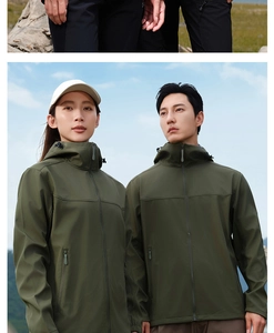 Detail of army green softshell hooded jacket with zipper closure and elastic cuffs