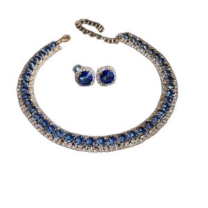 Elegant jewelry set featuring square blue crystal pendant necklace and matching stud earrings