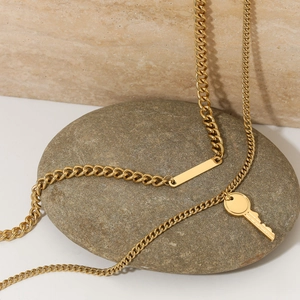 Golden double layer curb chain necklace with key pendant and rectangle plate charm
