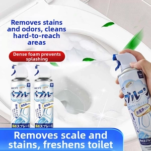 Detailed spray showing white cleaning foam covering the toilet bowl with long nozzle