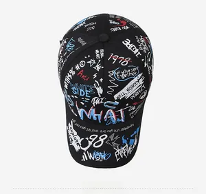 Top view of black graffiti baseball cap with colorful embroidery and urban street style