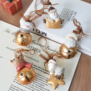 Set of vintage resin Christmas tree ornaments with Santa, snowman and gold bells