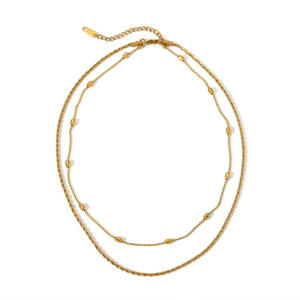 Double-layered golden stainless steel necklace with twisted rope chain and cylindrical beads
