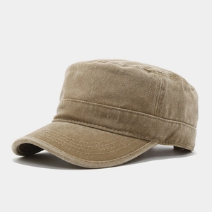 Detail view of washed khaki flat top army cap with precision stitching and vintage texture