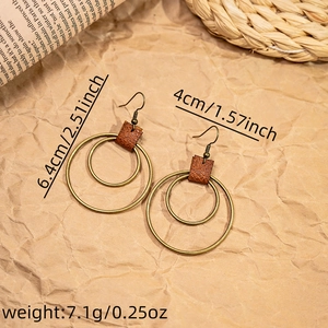 Detail view of Bohemian round earrings with dimensions 6.4cm by 4cm and weight 7.1g