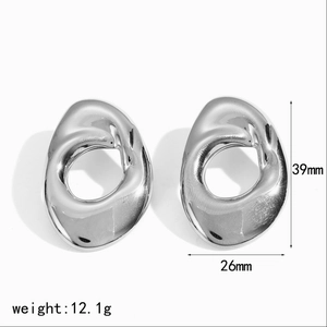 Detailed size view of silver geometric swirl earrings with 39mm height and 26mm width