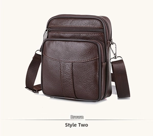 Detail view of coffee leather crossbody bag with three zipper compartments and lychee texture