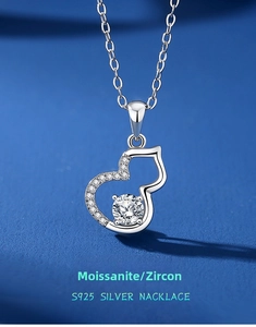 Macro detail of S925 silver hulu pendant featuring sparkling moissanite and pavé zircon