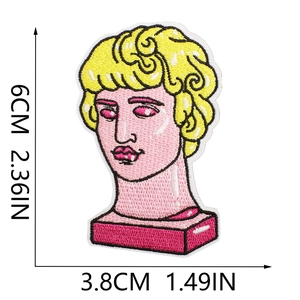 Close-up of colorful Greek sculpture embroidery patch measuring 6cm by 3.8cm