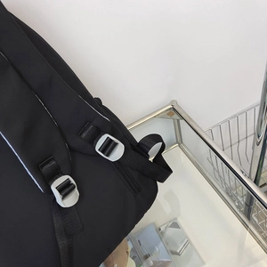 Close-up of black Japanese style backpack with durable nylon fabric and adjustable straps