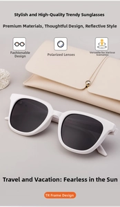 Detail view of white TR frame sunglasses with polarized lenses and a beige leather case