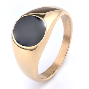 Detail of gold-plated stainless steel signet ring with a round black enamel inlay surface