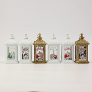 Row of Christmas LED lanterns featuring Santa and snowman patterns in white and bronze