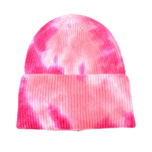 Detail of pink and white tie-dye knit beanie showing soft ribbed texture and folded cuff
