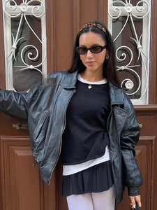 French retro style leopard print acetate headband worn by a model in a street fashion look