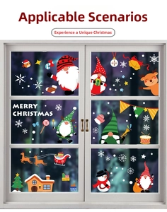 Detail view of festive Santa Claus and reindeer static window decals on a white glass frame
