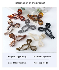 Macro detail of the acrylic bow hair claw clip showing 110mm size and hollow design