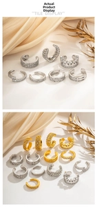 Detailed display of gold and silver U-shaped ear cuffs with cubic zirconia inlay