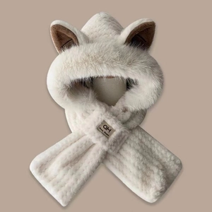 Macro detail of plush beige hooded scarf featuring cute animal ears and soft fur texture