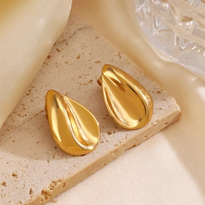 Chic gold-plated teardrop earrings with a polished mirror finish on a natural stone base