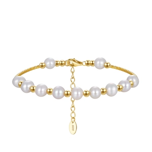 Minimalist S925 sterling silver pearl bracelet with golden beads and lobster clasp on white